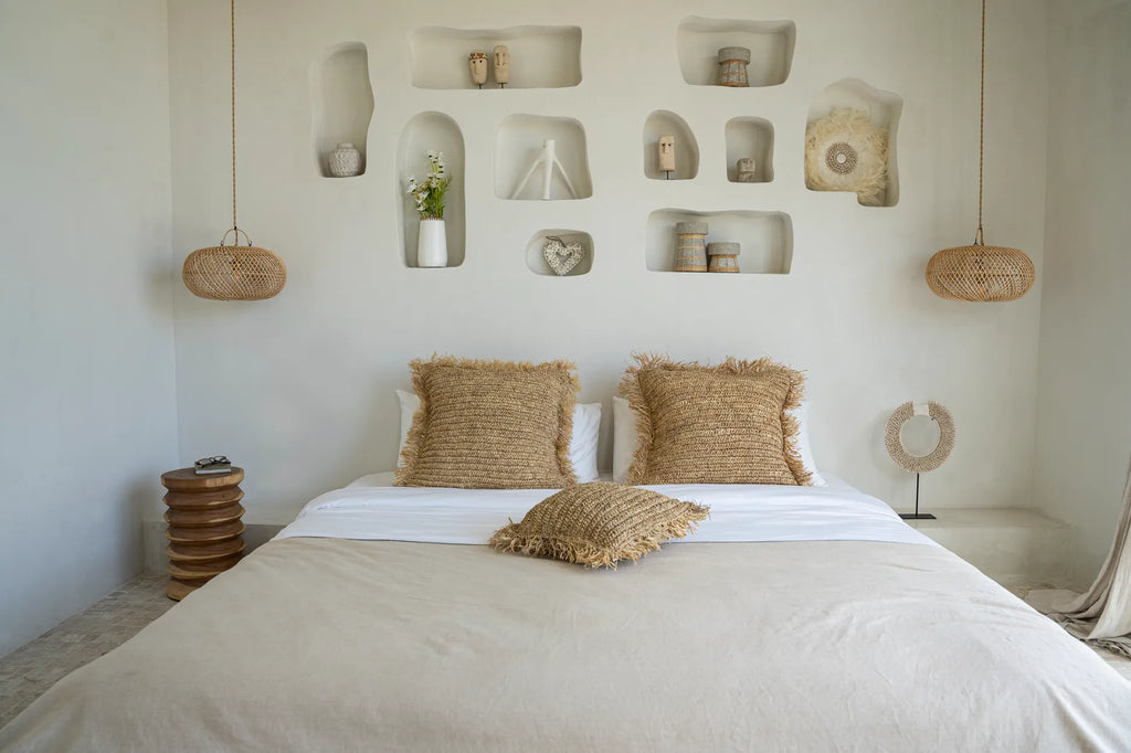 home decor with raffia lamps and stone statues