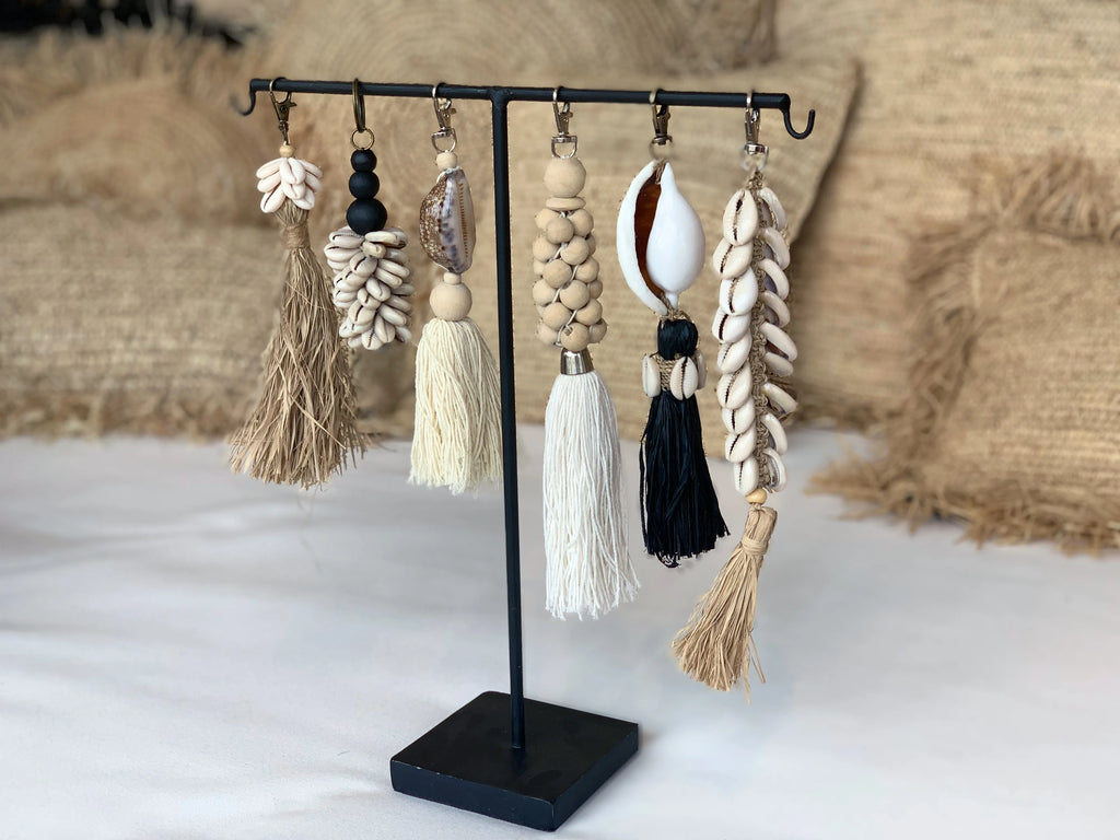 De Raffia Kauri Schelp Sleutelhanger